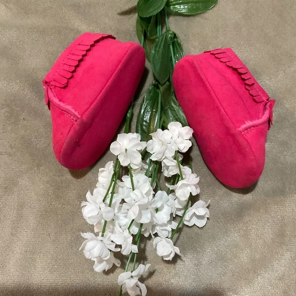 Child of Mine Pink Fringed Baby Moccasins with fleece lining.